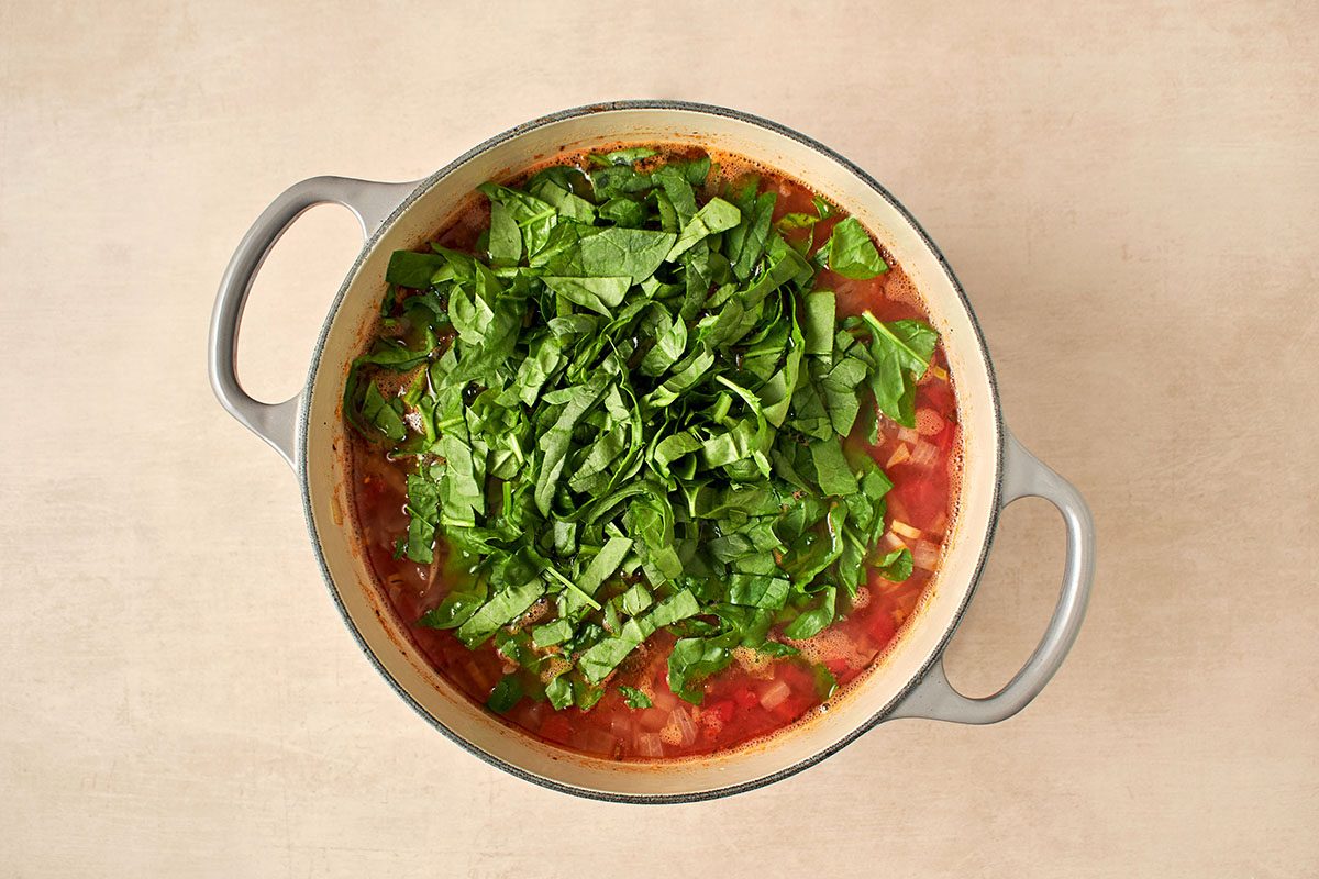 Remove bay leaf and add spinach.