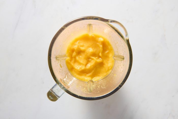 Peaches and syrup whizzed in a blender