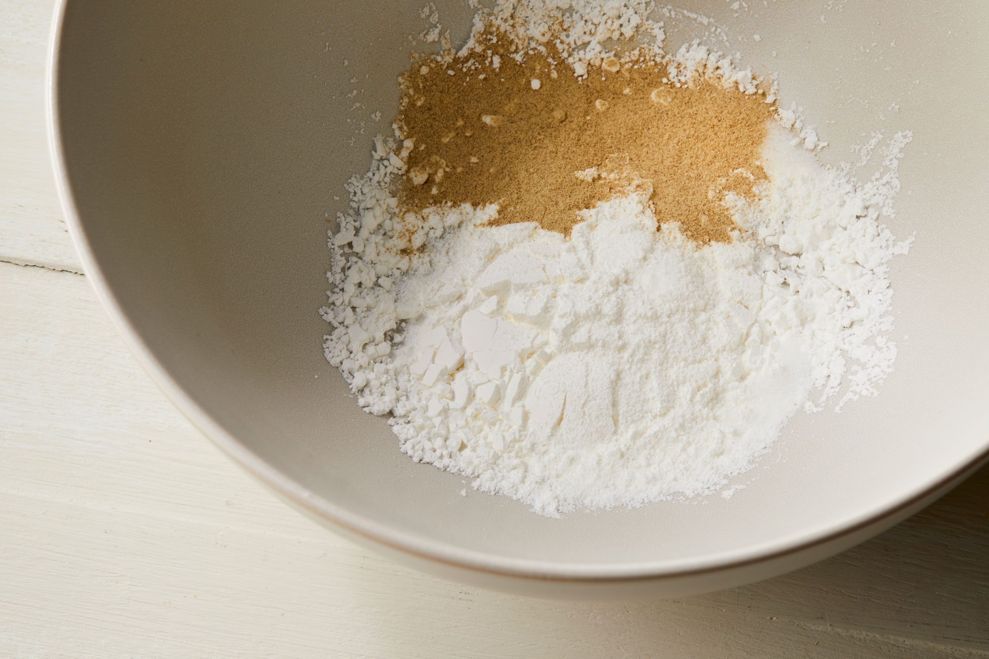In a large bowl combine cornstarch, white pepper and remaining 1 teaspoon salt