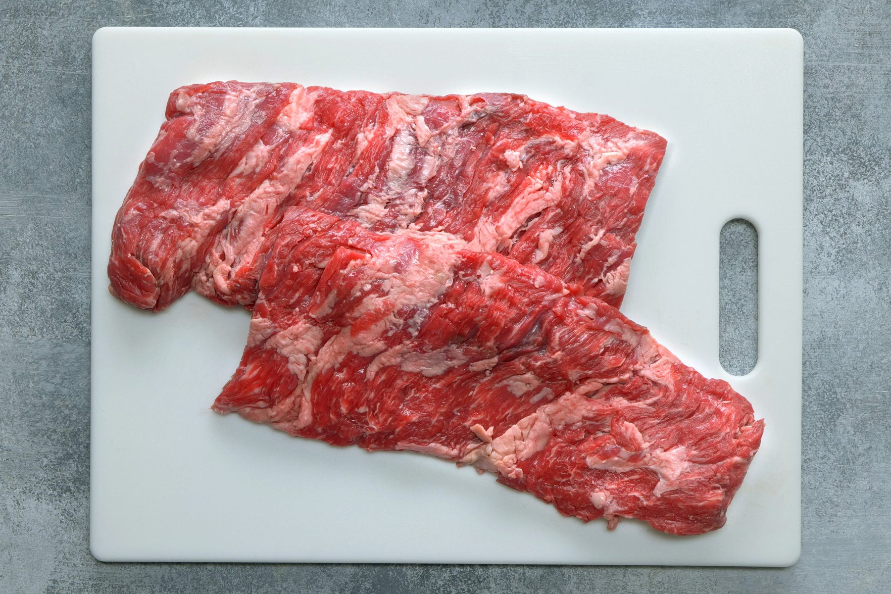 Beef Skirt Steak on a board