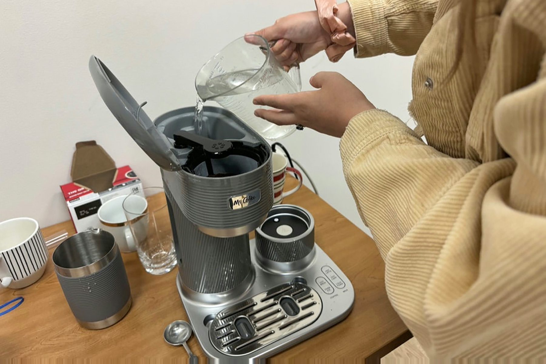 Pouring Water in Mr. Coffee 4 In 1