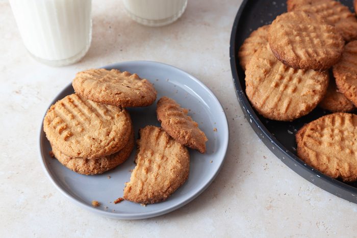 Close up of a few Taste of Home Gluten-Free Peanut Butter Cookies on a small plate