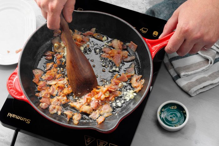 cooking pancetta in a skillet