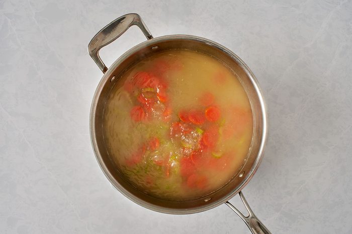 Simmer vegetables in broth