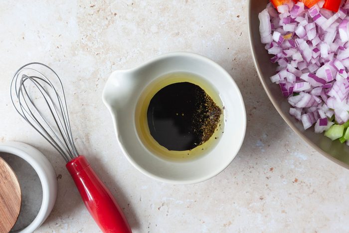 Step 2 of Taste of Home White Bean Salad is to make the dressing