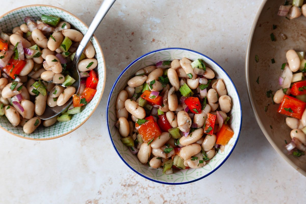 Two single servings of Taste of Home White Bean Salad, overhead angle