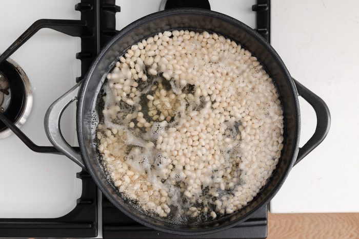 Beans being soaked and cooked.