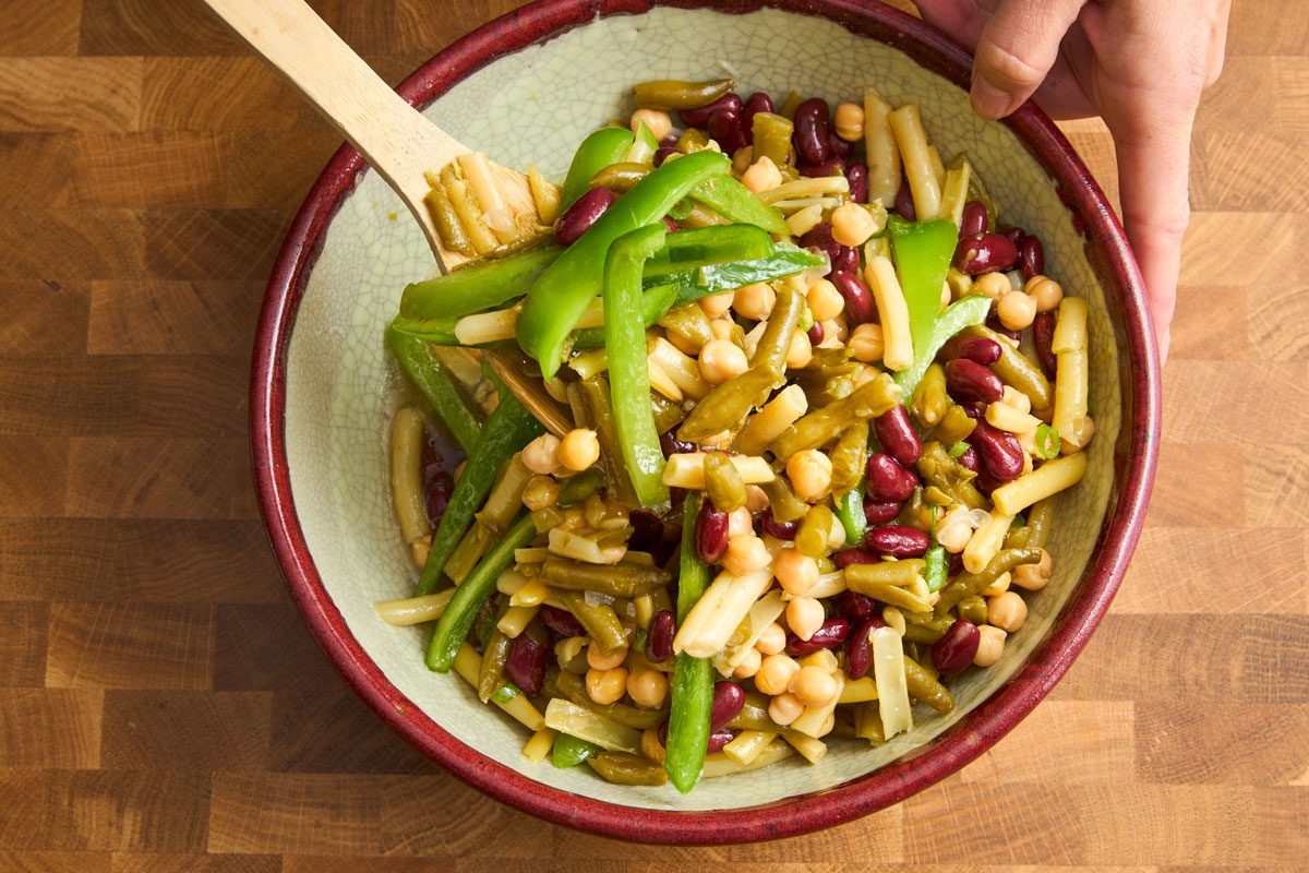 close up of 4-bean salad ready to be served in mixing bowl