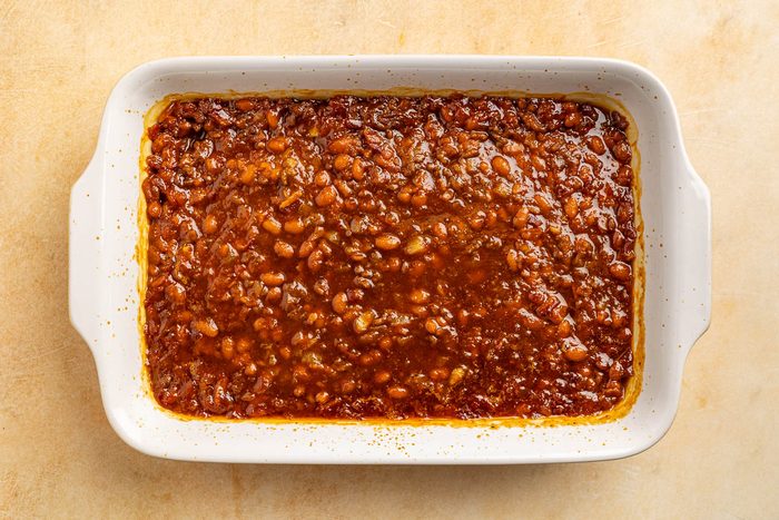 Taste of Home BBQ baked beans recipe photo of the rest of the ingredients added to the skillet.