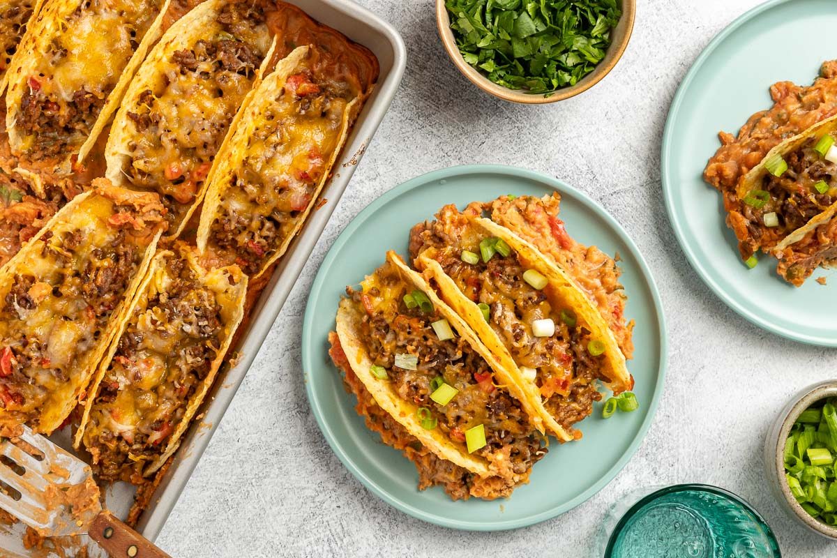 Taste of Home Baked Tacos recipe photo of the baked tacos served on plates.