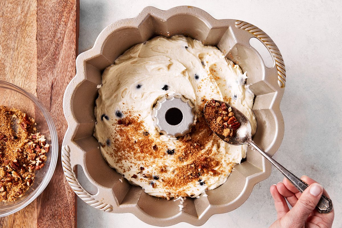 Step 2 Blueberry Coffee Cake, sprinkling brown sugar mixture over batter