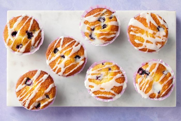 Top view shot of Blueberry Lemon Muffins on serving platter