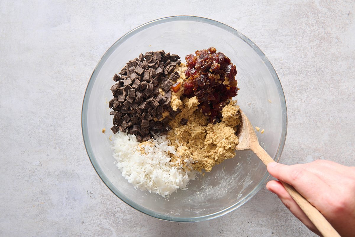 Adding the remaining breakfast cookie ingredients