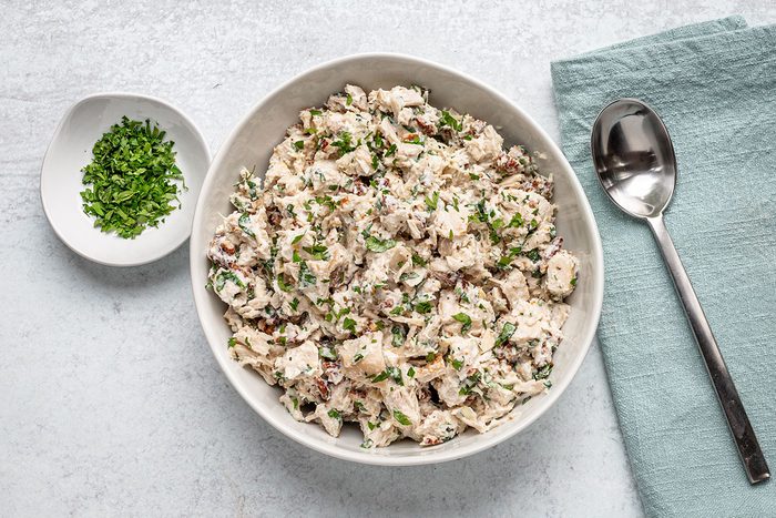 A serving bowl of chicken salad made with Greek yogurt, a Taste of Home recipe.