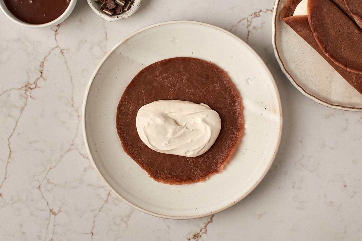 Fill crepes with cream filling