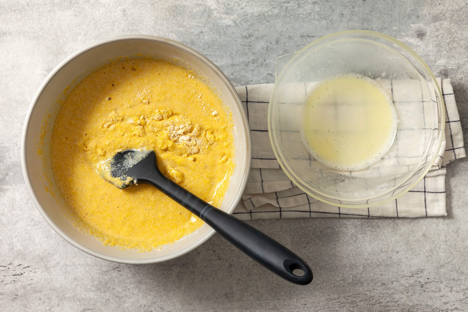 Top view shot of mixing wet and dry ingredients 