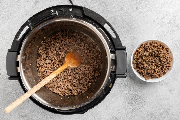 Taste of Home Instant Pot Beef Stroganoff recipe photo of the cooked beef in the pressure cooker.