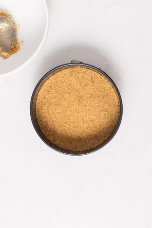 Crust pressed into 6 inch springform pan.