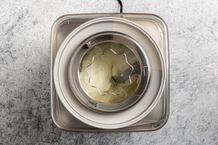 Taste of Home Lime Sherbet recipe photo of churning the sherbet in an ice cream maker.