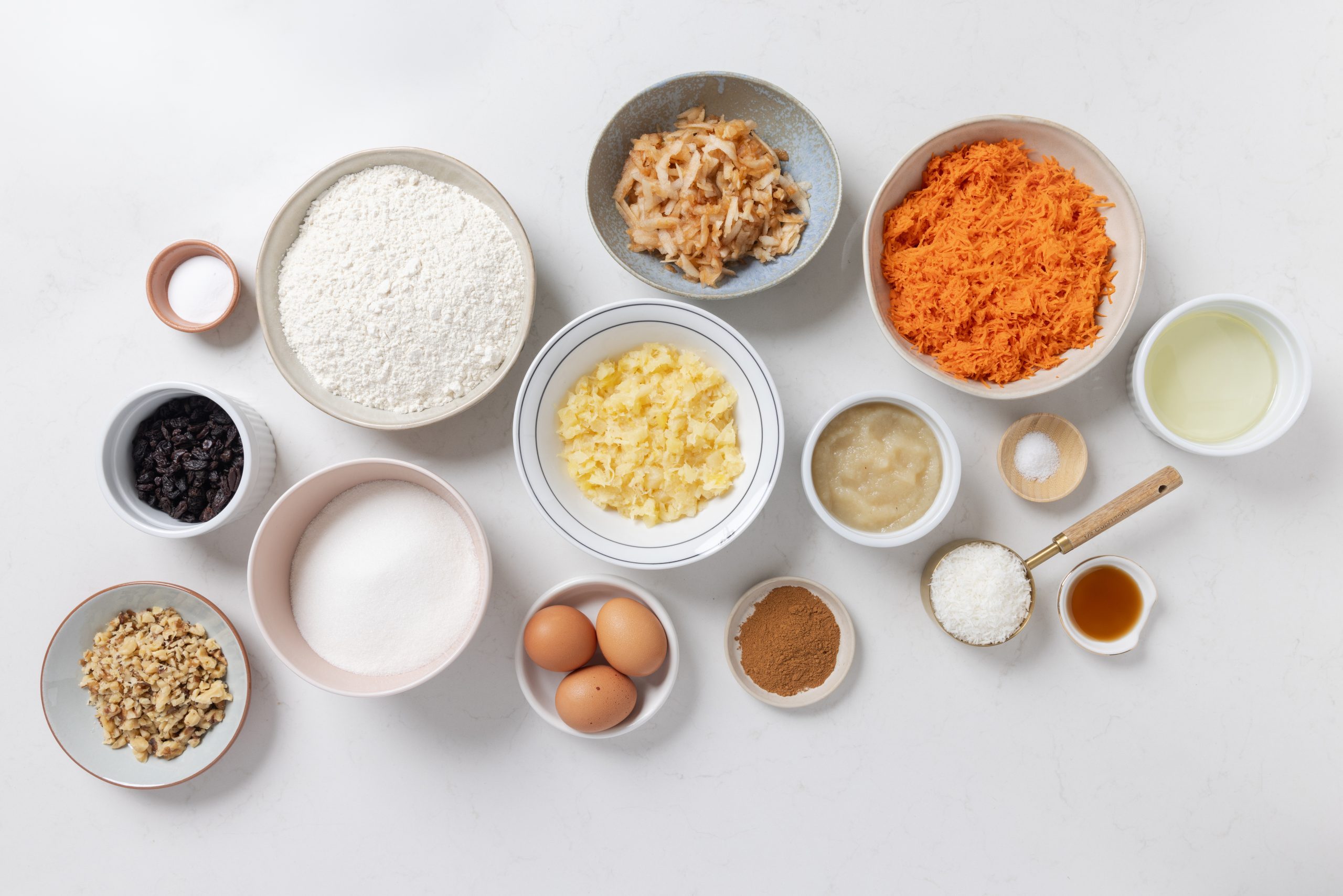 Ingredients for morning glory muffins on kitchen counter.