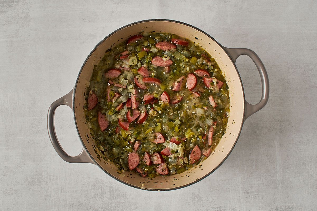 Cook sausage and vegetables