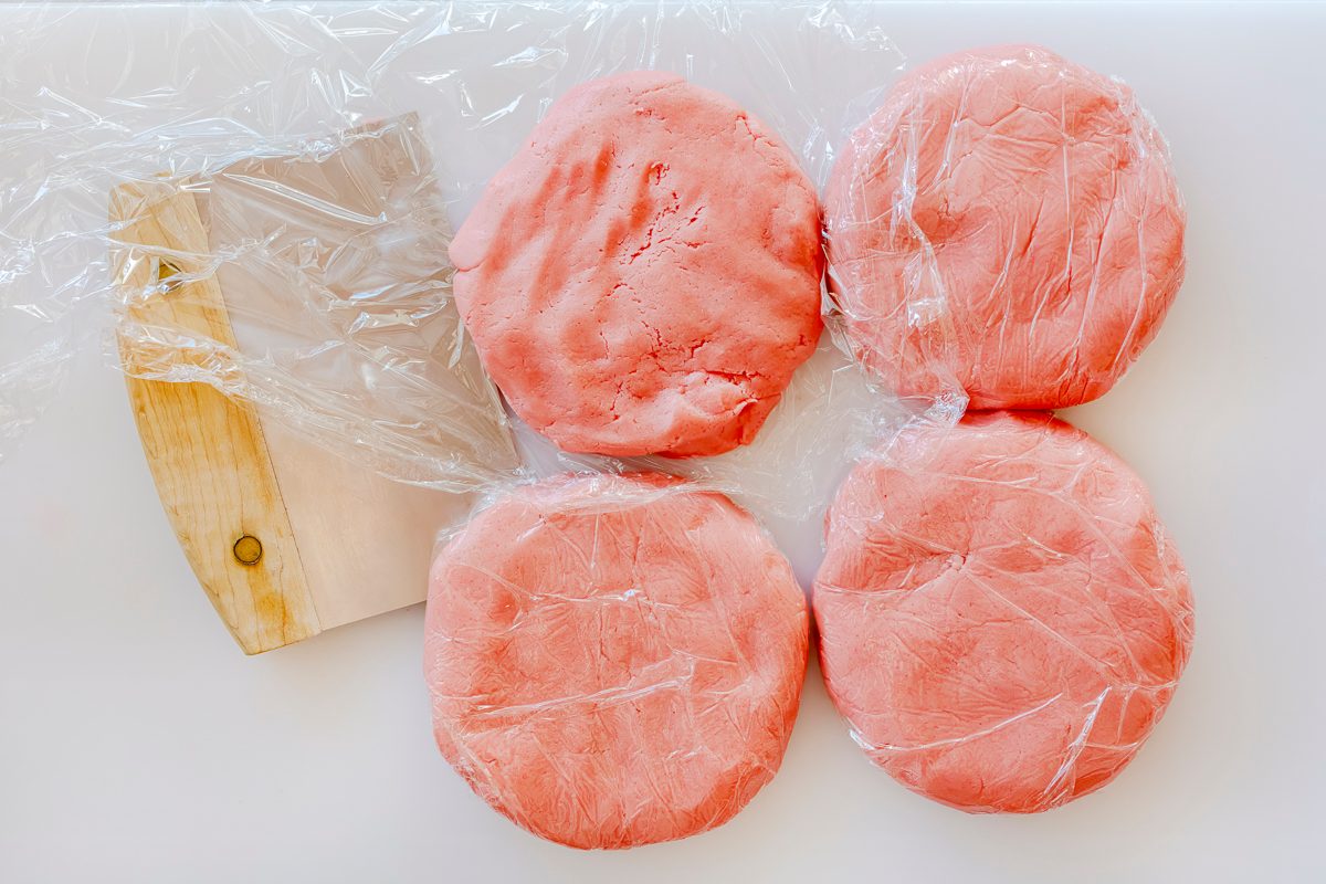 Pretty pink, jelly filled, strawberry sandwich cookies with step-by-step instructions from Taste of Home.