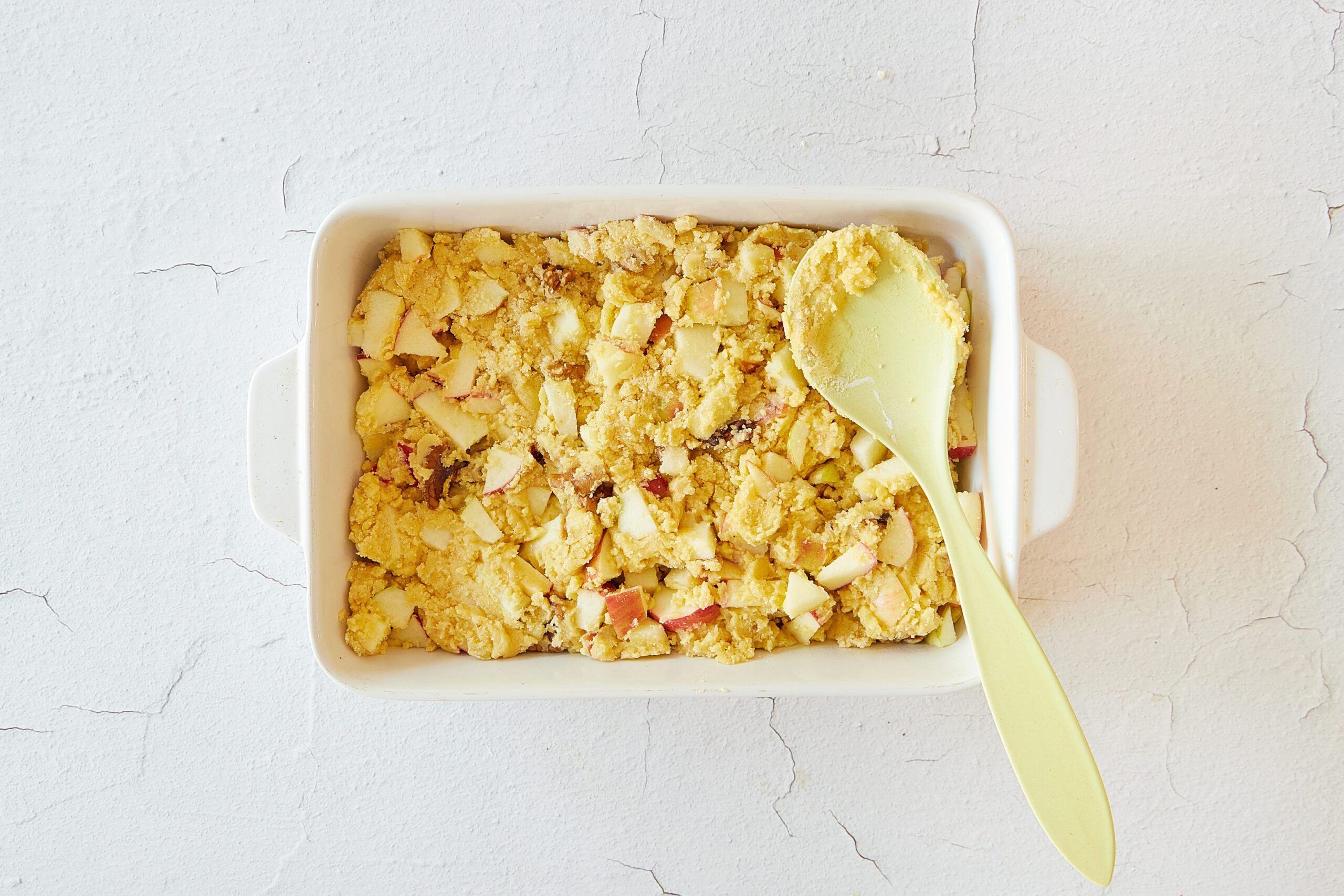 Bake the apple walnut cake.