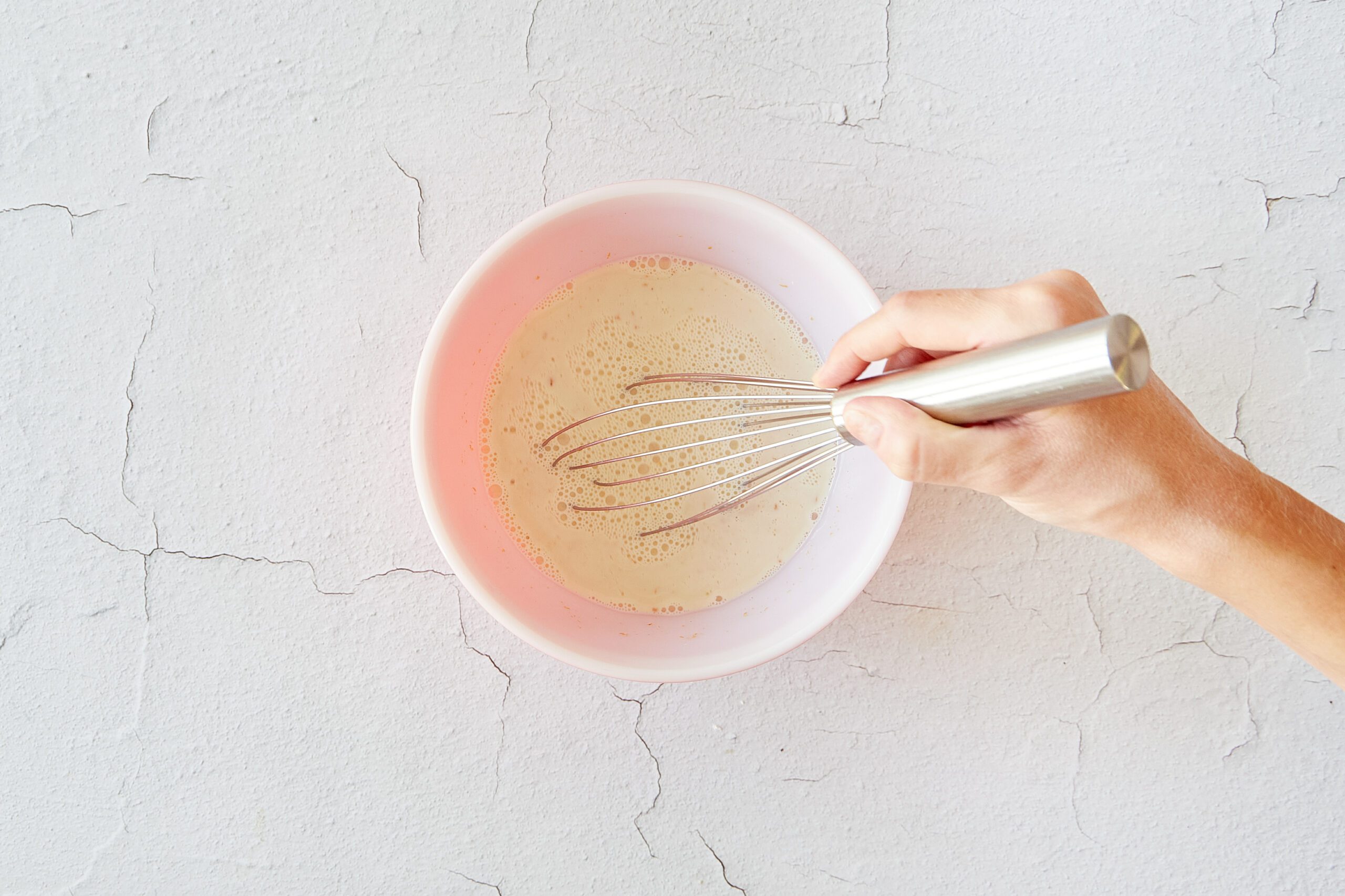 Mix the wet ingredients for peanut butter muffins