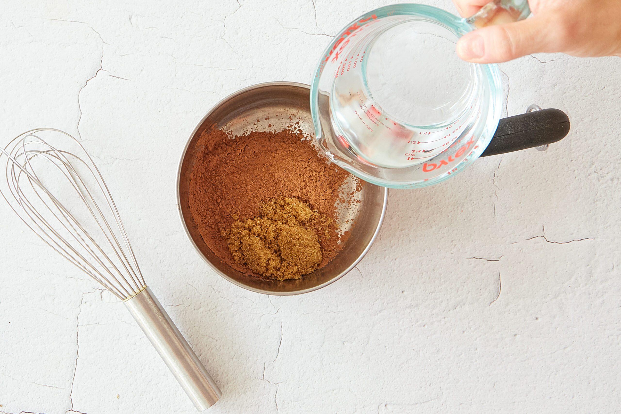 Make the cocoa paste for Mexican hot chocolate.