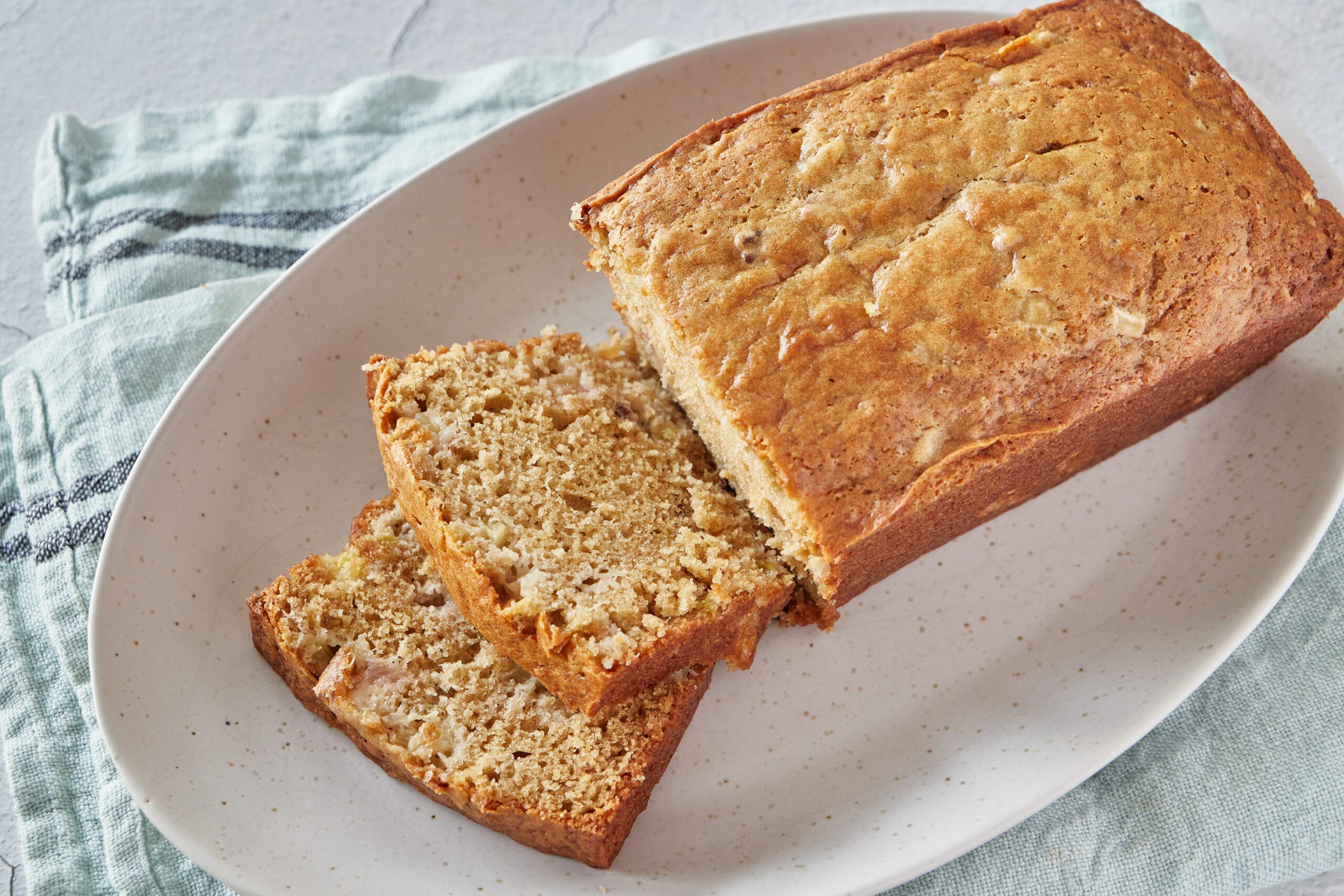Rhubarb bread is a delicious loaf cake studded with rhubarb.