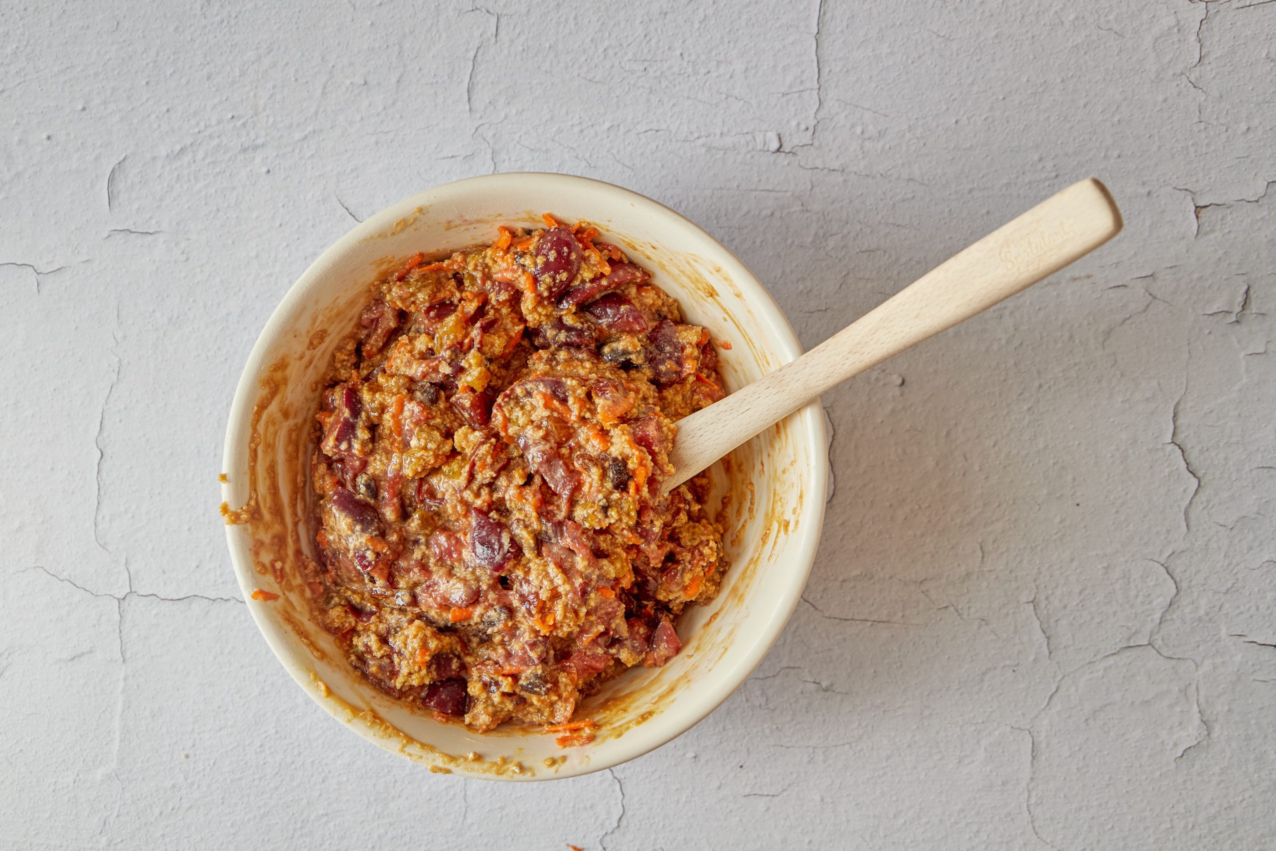 Mix the plum pudding batter.