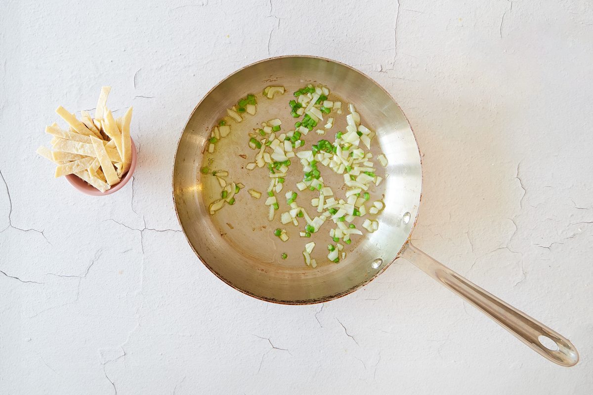 Cook the vegetables for breakfast tacos