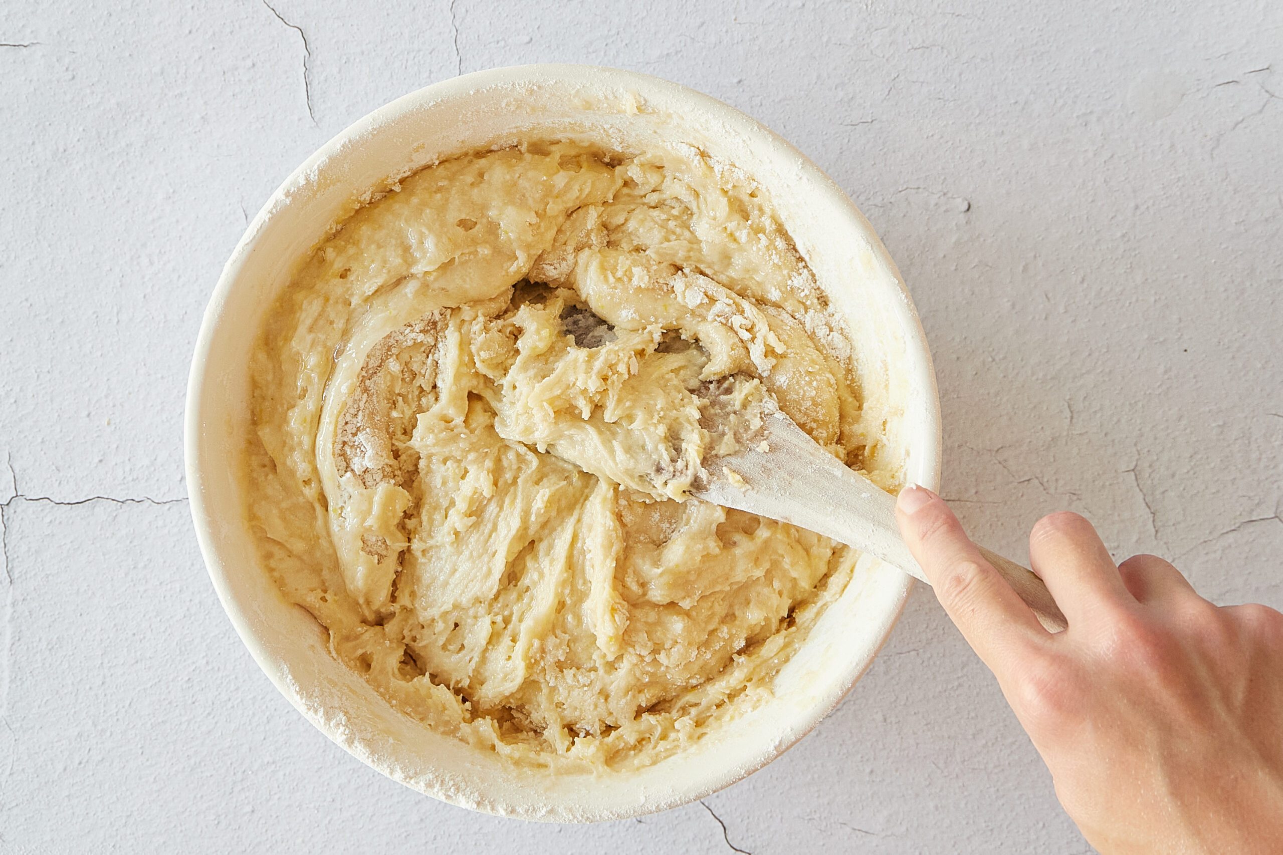 Make the batter for easy blueberry muffins