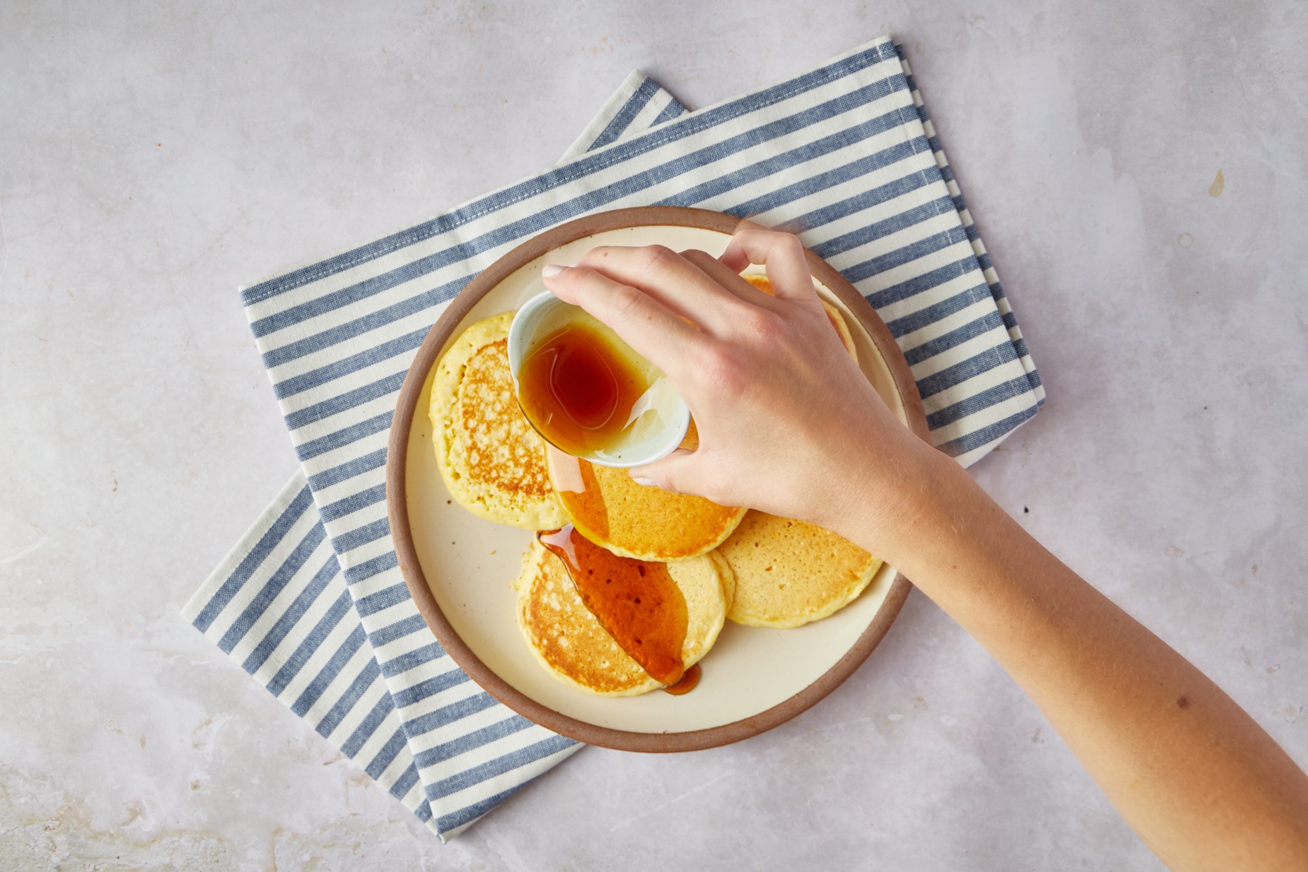 If you’re bored of your traditional flapjack recipe, try making these cornbread pancakes. They’re fluffy and full of comforting flavors and will delight any brunch spread.