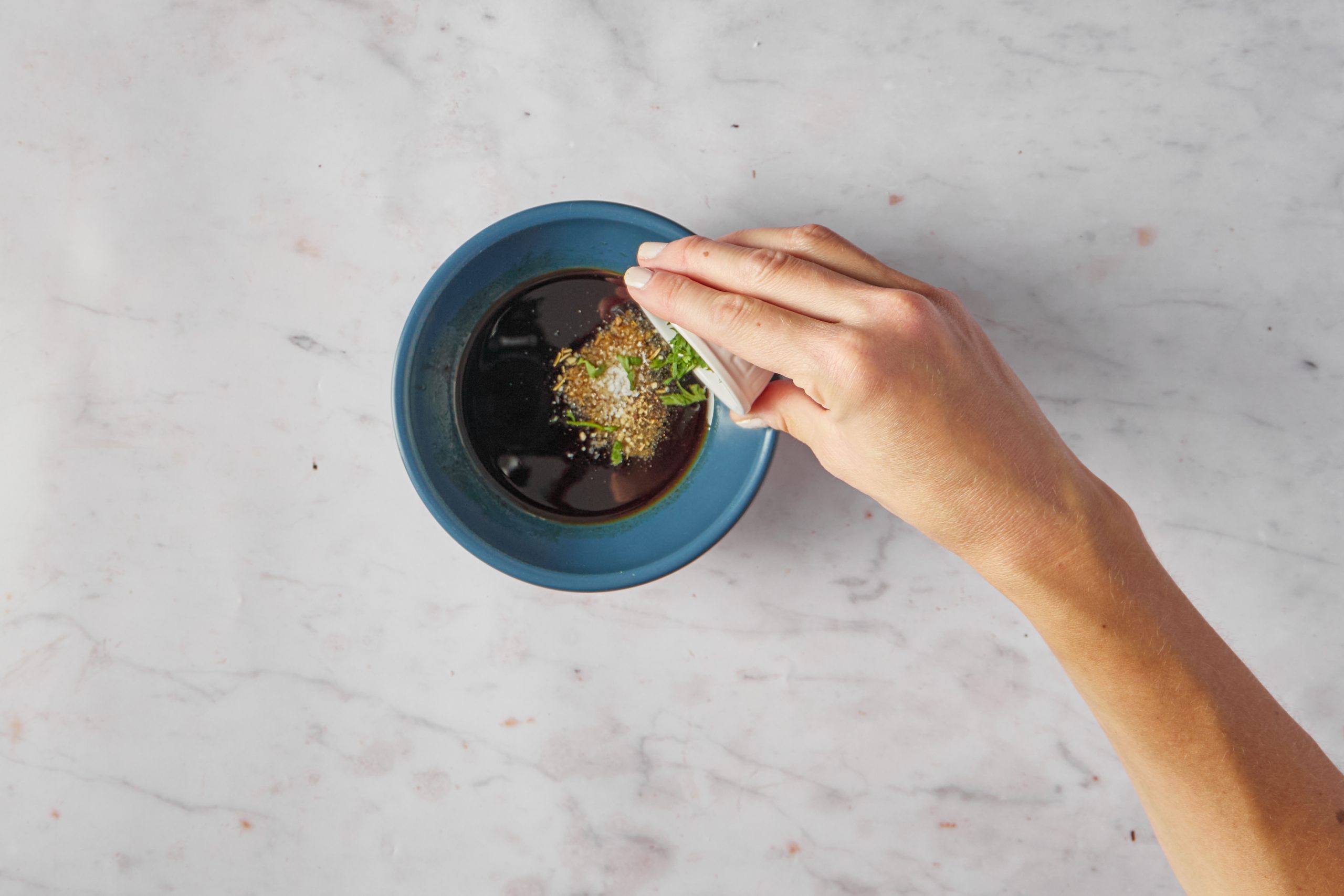 Make the dressing for the pasta salad with Italian dressing