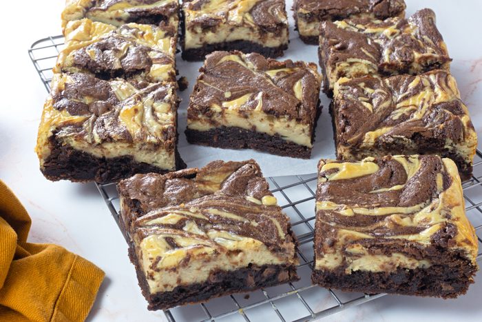 Cut peanut butter swirl brownies on a wire rack for Taste of Home RMS 11889
