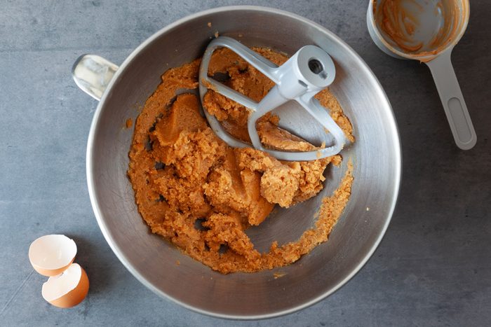 Step 1 of Taste of Home Spider Cookies is to combine the peanut butter, egg and sugar until fluffy