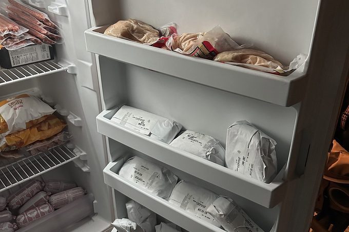 Open door of Whirlpool Upright Freezer