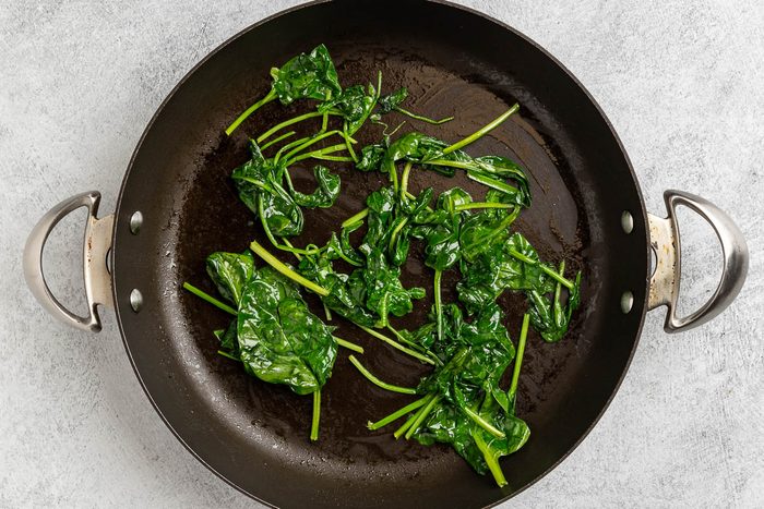 Taste of Home Turnip Soup recipe photo of sauteed baby spinach used to garnish the soup.