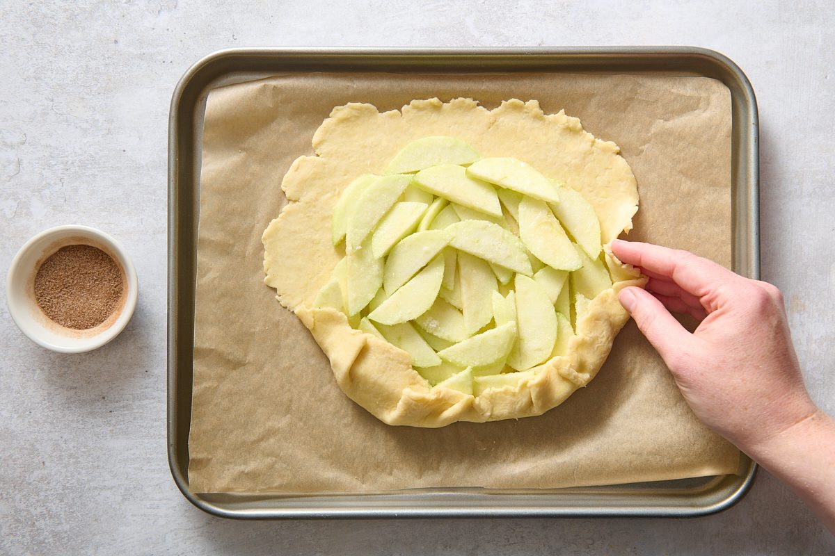 Folding the dough over the apple filling