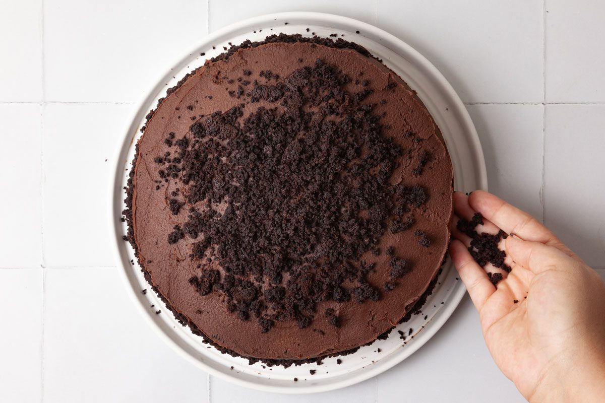 Step 4 of Taste of home Brooklyn Blackout Cake is to crumble the remaining cake layer and sprinkle it over the top and sides of the cake, pressing lightly to adhere. Refrigerate the leftovers.