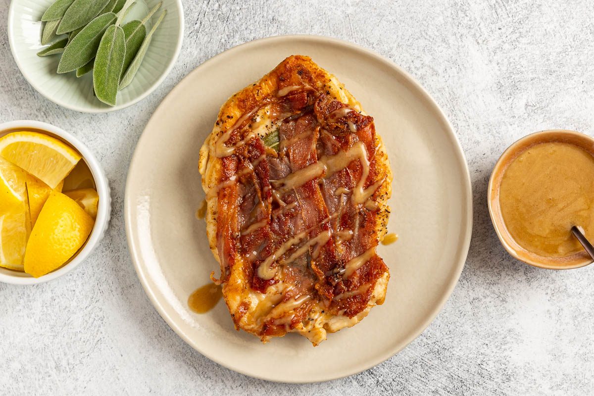 Taste of Home Chicken Saltimbocca photo of the cooked chicken with the cooked sauce.