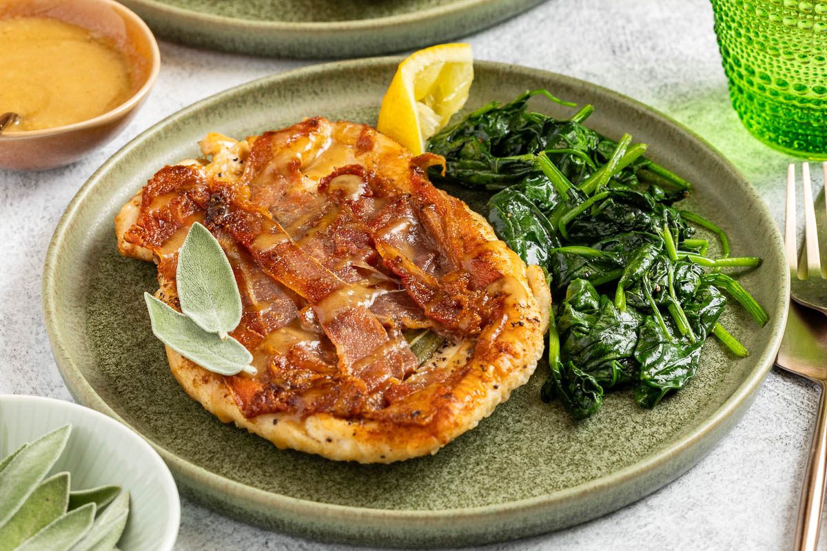 Taste of Home Chicken Saltimbocca photo of the finished recipe served on plates.