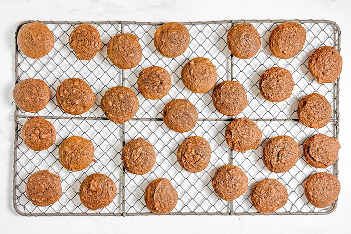 Taste of Home Chocolate Drop Cookies on a wire rack on a marble surface