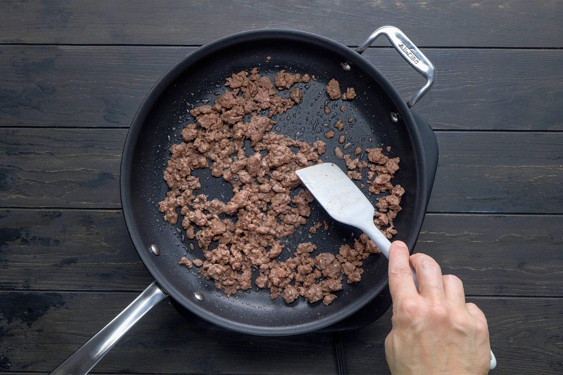overhead shot of cooked beef in a large skillet
