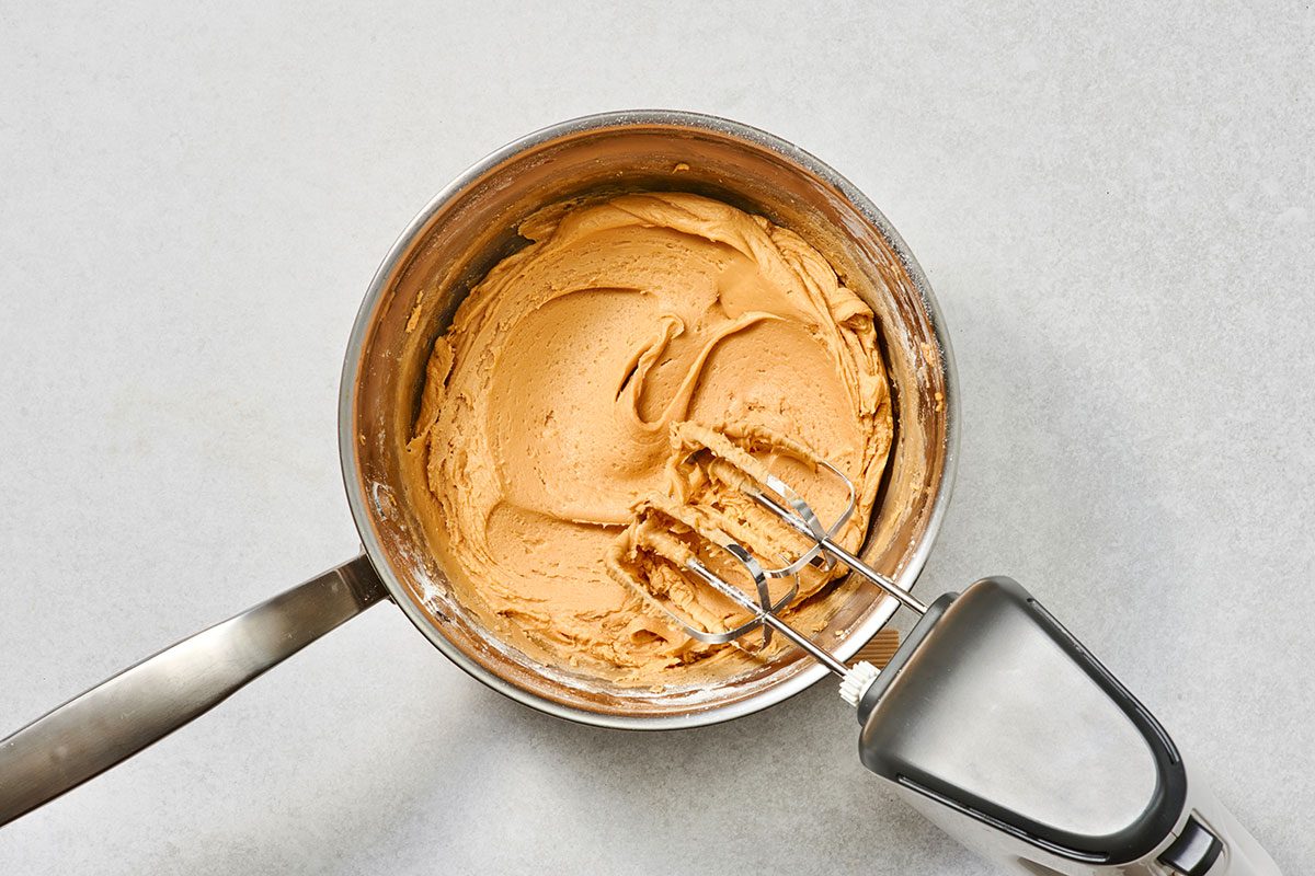 Confectioners sugar added until the frosting reaches a spreadable consistency