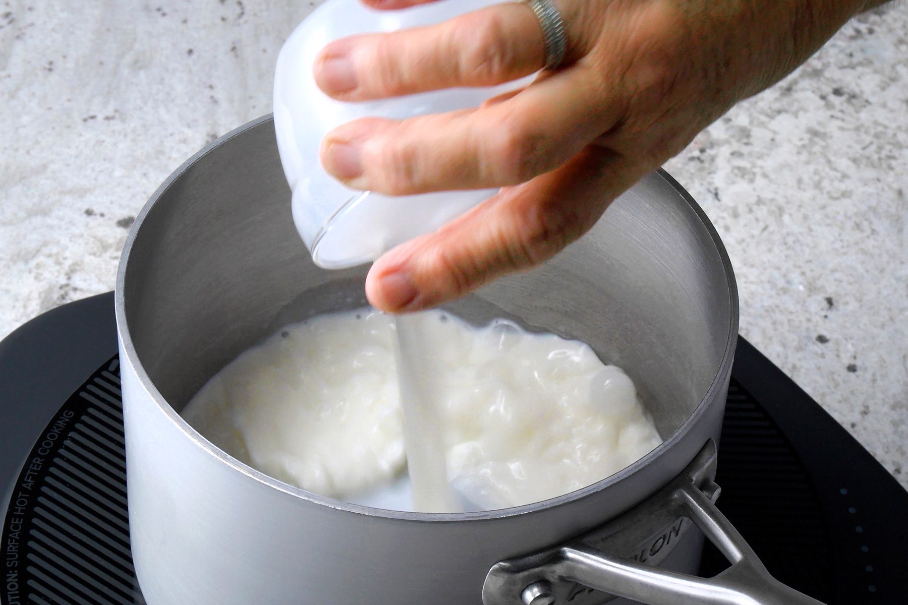 Scald milk in a saucepan; add butter, sugar and salt.