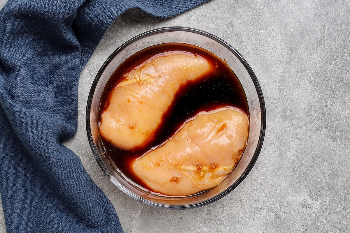 Marinating the chicken for grilled teriyaki chicken.