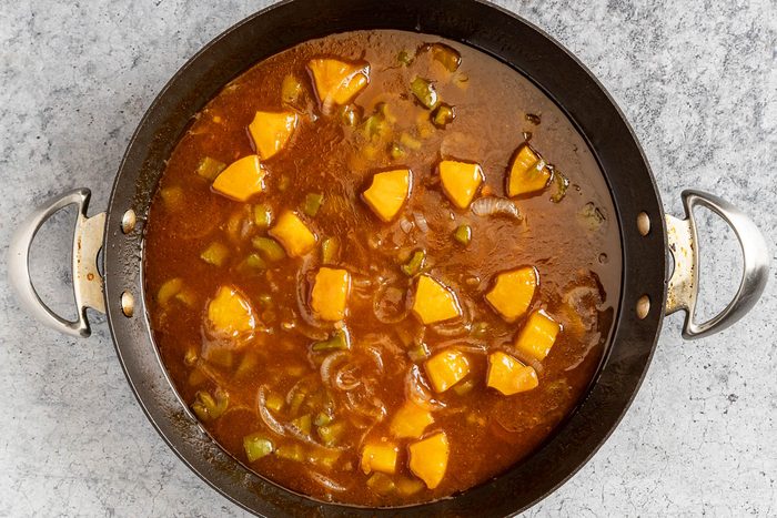 Taste of Home Hawaiian Pork Chops photo of the chops removed from the skillet and the cornstarch slurry added to the sauce for thickening.