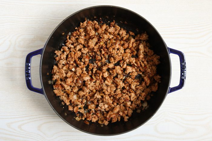 Browning sausage and onion